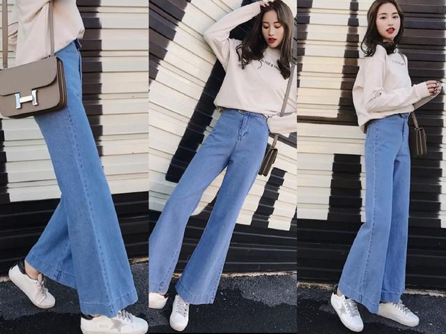米色卫衣搭配look4,这款时尚的女士蓝色阔腿裤,以精致的直筒版型设计